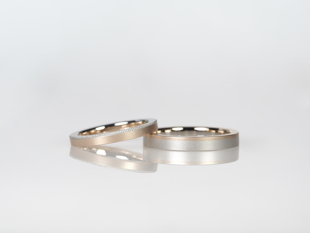 日本一に輝いたジュエリー職人が制作したオーダーメイドマリッジリングです。 ピンクゴールドとプラチナのコンビでミルグレインを施しました。